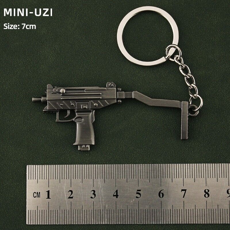 mini TOY GUN Mini UZI weapon  keychian gift metal 7cm