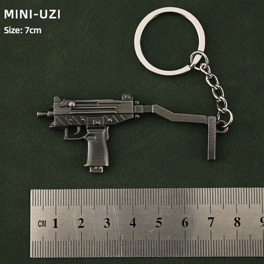 mini TOY GUN Mini UZI weapon  keychian gift metal 7cm